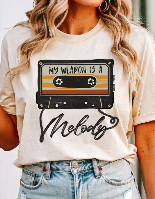My Weapon Is A Melody | Comfort Colors Ring-Spun Cotton | He Found Me | Christian Bible Verse Tee